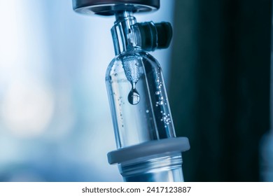 Close up medical intravenous IV drip in hospital background - Powered by Shutterstock