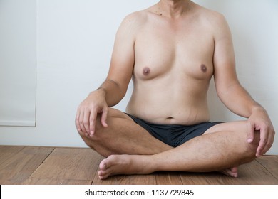 Skinny fat man boobs