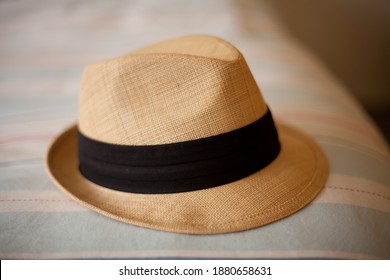 Close Up Of A Mens Fedora Hat Made Of Woven Straw, Lightweight Summer Protection From The Sun