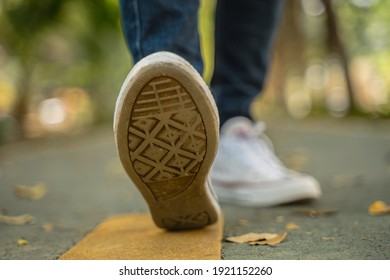 A Close Up Of The Men's Shoes Walking Close Up.