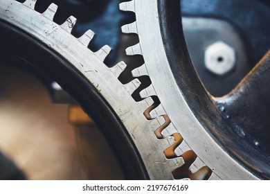 Close Up Of Metal Cog Wheel In Engine Of Machine.
