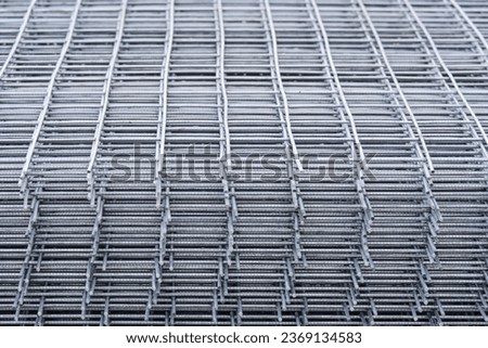 Close up of a metal mesh. The texture of the grid.