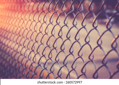 Close up Metal net in sunset time, Vintage color - Powered by Shutterstock