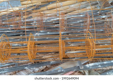 Close Up Of Metal Stainless Rusted Steel Wire Lines On Site. Product In Construction Site. Raw Material Background.