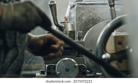 Close up of a metalworker's hands skillfully operating a lathe machine, shaping a piece of metal with precision and expertise in a workshop environment, sparks flying as the metal is cut and shaped
