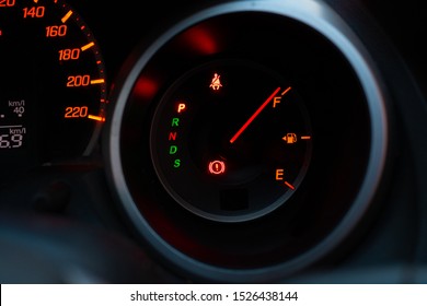 Close Up Of Meter Panel With The Needle Pointing At F On Black Blackground, Fill The Gas Car Tank

