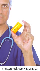 Close Up Of Middle Aged Doctor Holding Prescription Bottle Isolated On White Focus On Pills