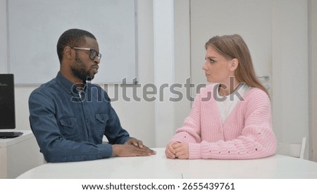 Close up of Middle Aged man Talking Woman in Meeting