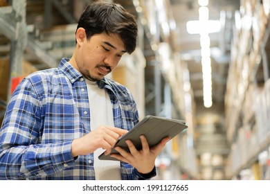 Close Up Middle Eastern Auditor Man Use Digital Tablet Device To Check Order In Storage At Distribution Warehouse Cargo For Manage About Delivery Of Import And Export Business Concept