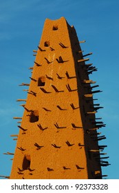 A Close Up Of The Minaret On The Agadez Mud Mosque