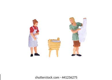 Close Up Of Miniature People For Laundry And House Keeping Concept Isolate On White Background.