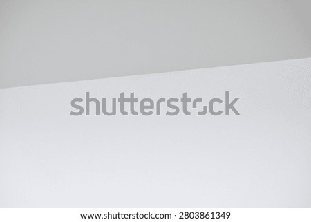 Close up of a minimalist white surface featuring smooth texture and clean geometric lines. Showcasing modern simplicity, architectural details, and elegant abstract composition, ideal for interior design, contemporary backgrounds, and creative layouts.