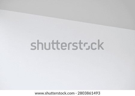Close up of a minimalist white surface featuring smooth texture and clean geometric lines. Showcasing modern simplicity, architectural details, and elegant abstract composition, ideal for interior design, contemporary backgrounds, and creative layouts.