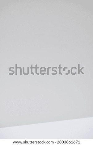 Close up of a minimalist white surface featuring smooth texture and clean geometric lines. Showcasing modern simplicity, architectural details, and elegant abstract composition, ideal for interior design, contemporary backgrounds, and creative layouts.