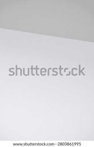 Close up of a minimalist white surface featuring smooth texture and clean geometric lines. Showcasing modern simplicity, architectural details, and elegant abstract composition, ideal for interior design, contemporary backgrounds, and creative layouts.