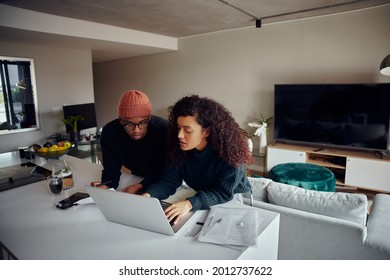 Close Up Of Mixed Race Couple Using Laptop For Online Shopping. Happy African American Couple Using Credit Card For Online Banking. High Quality Photo