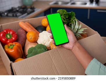 A Close Up Of Mobile Phone Screen With Vegetable Box Delivery - Chroma Key