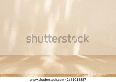 close up mockup studio with shadowing and light of beige plain concrete wall texture and tabletop for show product on display background concept