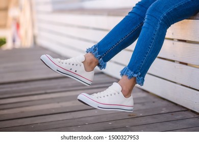 Candid Asian Girl in Jeans and White Converse