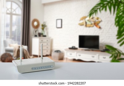 Close Up Modem Box On The Table, Decorative Home Concept Technological Tool Background Style.