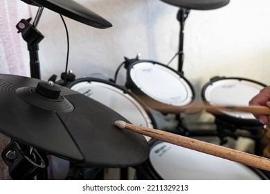 close up of a modern black electronic drum or e-drum. Modern audio instrument abstract. Musician equipment.