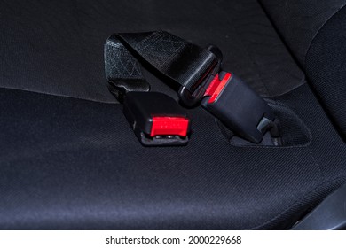 Close up of Modern car interior - rear seats with the seat belts