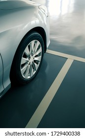 Close Up Of Modern Car In Parking Lot, Anti Slip Coating Floor For Safety, Car Parked In The Right Position In Modern Building Carpark Area