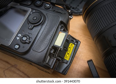 Close Up  Modern DSLR Camera And SD Memory Card