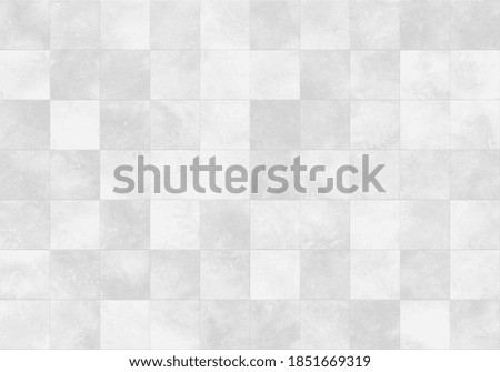 Close up Modern floor abstract white concrete tile wall background and texture. Abstract background or seamless pattern of tiles in white and gray colors. Square ceramic mosaic cube pattern.