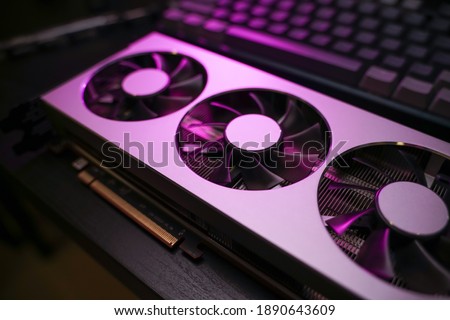 A close up of a modern GPU Graphic card unit heatsink with active fan for thermal solution