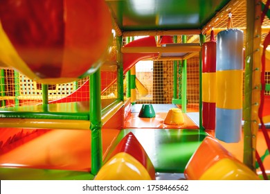 Close Up Modern Inflatable Playground For Children Indoor. Colorful Kids Zone With Safety Net For Playing