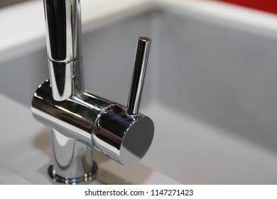 Close Up Of Modern Kitchen Faucet And Sin