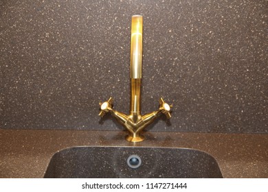 Close Up Of Modern Kitchen Faucet And Sin