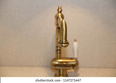 Close Up Of Modern Kitchen Faucet And Sin