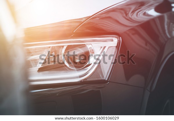 Close up of\
modern led car headlights,\
mobility