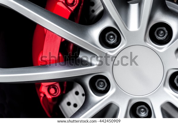 Close up of a\
modern sport wheel with red\
brake