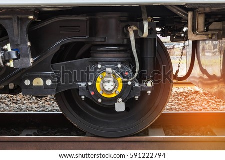 Close up modern wheel train system on track