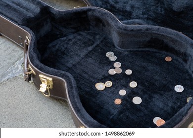 Close Up Of Money In A Guitar Case