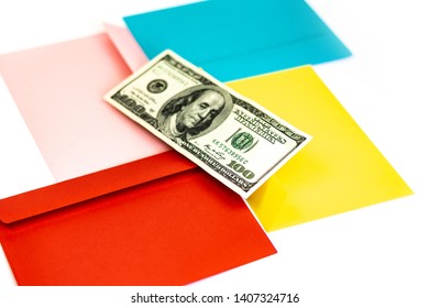 Close Up Of Money In Pink Envelope Are Lying On The Multi Colored Envelopes And Letters As A Background.  Branding Mock Up; Different Colored Envelopes On The Table. 