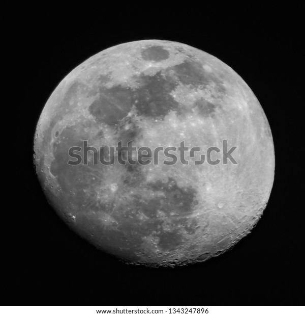 Close up moon surface, 95% Illumination of lunar\
disk, waxing gibbous moon before full moon seen from North\
hemispere, 700 mm focal lenght. Black background square frame.\
Astronomy, astrology,\
science