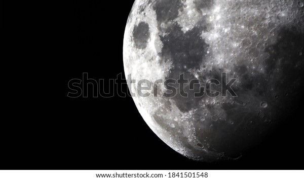 Close up of moon texture /  It is the fifth\
largest satellite in the Solar\
System