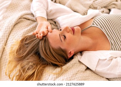 Close Up Moring Portrait Of Pretty Blonde Woman Laying On The Bed, Exited Face, Perfect Relaxing Time Alone.