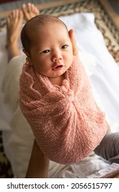 Close Up Mother Hands Holding Cute Newborn Baby, Family Parents Love Sad Concept.