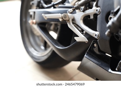 close up of the motorcycle engine with the light of a motorcycle, a closeup shot of a motorcycle engine,  red motorcycle on a white background - Powered by Shutterstock