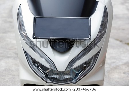 Close up of motorcycle front lamp 