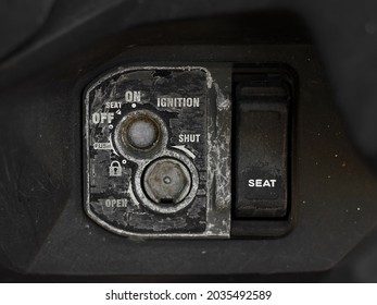 close up of motorcycle key ignition switch. ignition switch starter keyhole technology motorcycle detail. peeling paint