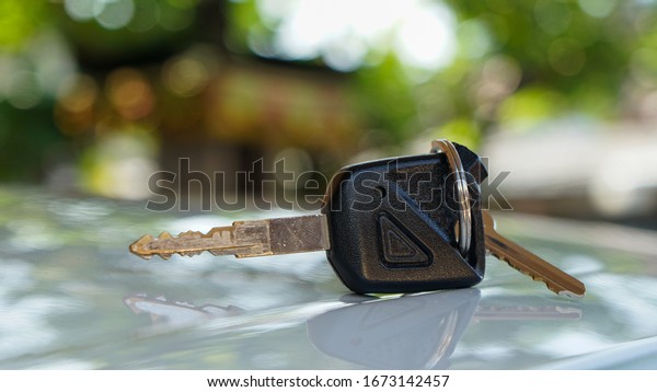 Close up the\
motorcycle key on the\
table