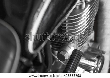 Close up of motorcycle part, engine, meter and head lamp