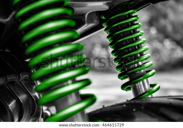 Close Up of\
Motorcycle Shock Absorber and\
Spring