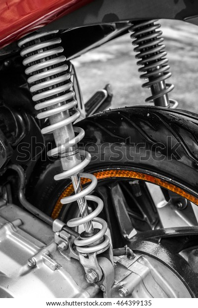 Close Up of Motorcycle Superbike Shock Absorber\
and Spring